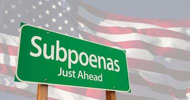 4k Subpoenas Green Road Sign Over Ghosted American Flag video