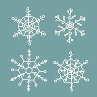 Set of white snowflakes for Christmas and New Year design. For postcard, patern or badge. Isolated background. Vector