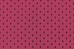 Sport Clothing Fabric Texture Background. Top View of Cloth Textile Surface. Image toned in Viva Magenta, color of the 2023 year photo