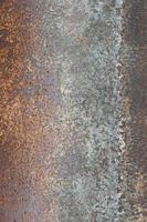 Dark worn rusty metal texture background photo