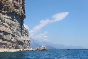 Landscape of Turkey natural rock mountains over blue sea water photo