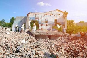 Collapsed industrial multistorey building in daytime photo