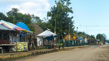 Solferino Quintana Roo Mexico 2021 Driving through village Solferino mud and tropical jungle Mexico. photo