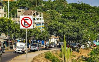 Puerto Escondido Oaxaca Mexico 2022 Busy road street driving cars traffic jam Puerto Escondido Mexico. photo