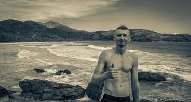 Tourist traveler Ilha Grande Lopes Mendes beach panorama Brazil. photo