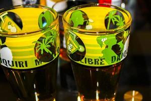 Leherheide Bremerhaven Germany 2010 Green yellow Cuba Libre Glasses in bar discotheque at night. photo