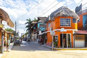 Holbox Quintana Roo Mexico 2021 Colorful Holbox island village with stores mud and people Mexico. photo