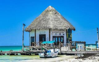 Holbox Quintana Roo Mexico 2022 Beautiful Holbox island beach with boat and turquoise water Mexico. photo