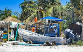 Holbox Quintana Roo Mexico 2022 Beautiful Holbox island beach with boat and turquoise water Mexico. photo