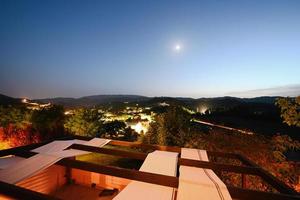 View from terrace house at night Nocera Umbra,  town and comune in the province of Perugia, Italy. photo