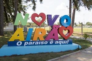 Novo Airao, Amazonas, Brazil November 19 2022 Colorful sign welcomes visitors to the local park in the city photo