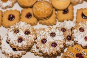 tasty little christmas cookies with marmeldade and sugar photo