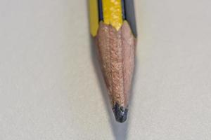 macro view from a pencil on a white sheet background photo