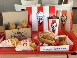 Ayutthaya,Thailand - Apr 06,2022- KFC Hamburger and Fried Chicken set at fast food restaurant Kentucky Fried Chicken KFC is a large restaurant chain. At Big C, Wangnoi branch in Thailand - Asia. photo