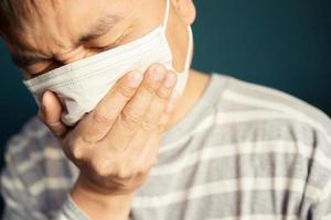 Men wear masks to protect them from the virus, Covid 19 and batteries. photo