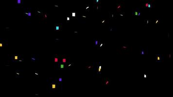 Colorful confetti blowing in the air. Anniversary celebration party concept. video