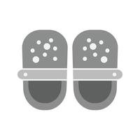 zapatos de bebé icono plano en escala de grises vector