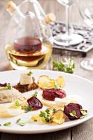 Gourmet salad with beet and herring photo