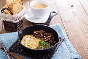 Tofu omelet with pesto and mushrooms photo