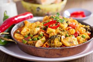 Vegan curry with tofu and vegetables photo