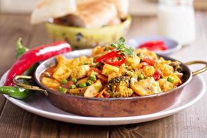 Vegan curry with tofu and vegetables photo