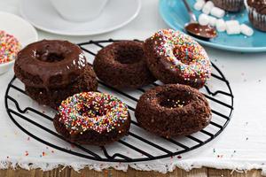 Homemade baked chocolate donuts photo