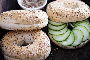 Everything bagels with cream cheese and cucumber photo