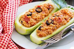 Stuffed squash with millet, tomatoes and olives photo
