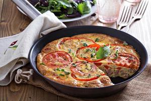 Frittata with vegetables and ham photo