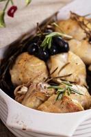 Chicken baked with grapes and rosemary photo