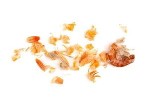 Shrimp heads and shrimp shells, food waste, leftovers, waste. Natural seafood. Lunch. Dinner isolated on white background. photo