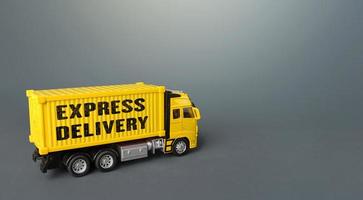 Express delivery yellow truck. Transport service infrastructure. Logistics. Transportation company. Urgent delivery, shipping. Distribution of orders and goods to consumers in a short time. photo