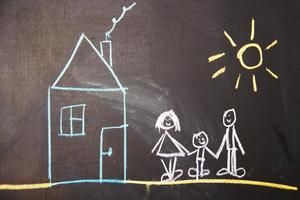 happy family drawn on a chalkboard photo