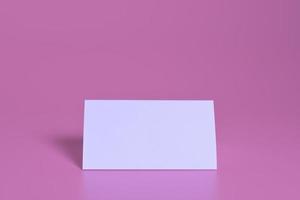 White paper isolated on pink background photo