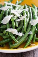 Sauteed green beans on big plate photo