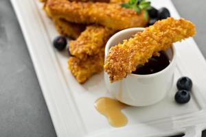 French toast sticks with blueberries and syrup photo