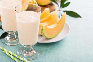 Healthy cantaloupe smoothie in a tall glass photo
