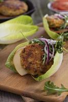 Vegan burgers with quinoa and vegetables photo