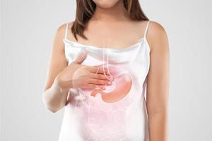 A woman suffering from gastroesophageal reflux disease photo