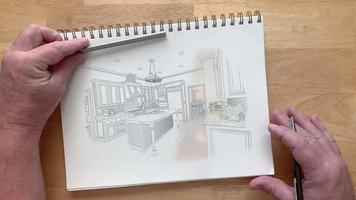 4k Custom Kitchen Photo Appears Over Artist Drawing On Pad of Paper video