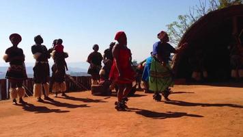 African tribe dancing in front of tourists video