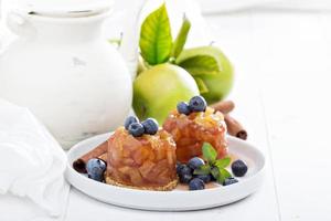 Apple cakes with blueberries photo