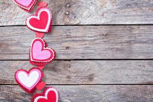 Valentines day decorations on a wooden surface photo