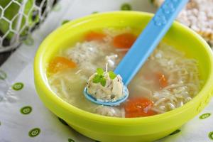 Chicken soup with meatballs photo