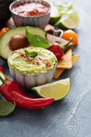 Mexican cuisine ingredients and guacamole photo