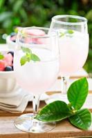 Cold watermelon drink on the table outdoors photo