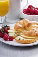 Croissant sandwich with ricotta and apples photo