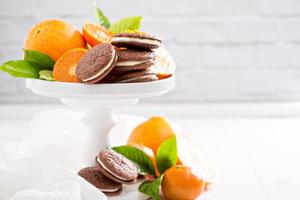 Chocolate orange cookies with cream filling photo