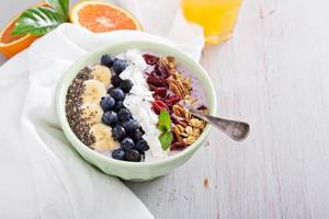 Breakfast smoothie bowl with fruits photo