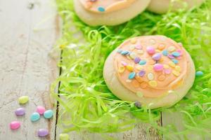 Pastel Easter cookies with colorful sprinkles photo